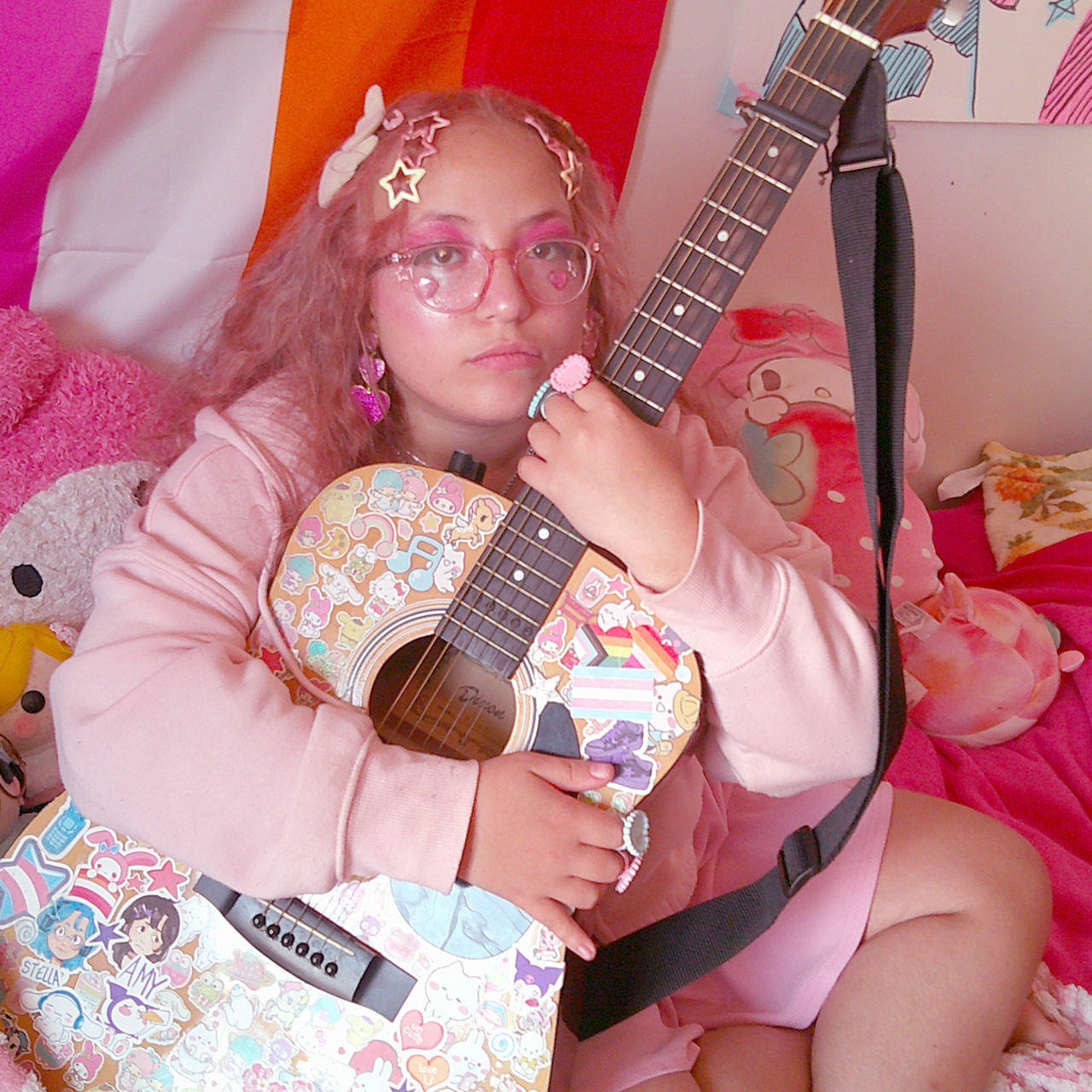 allydaonline with her guitar